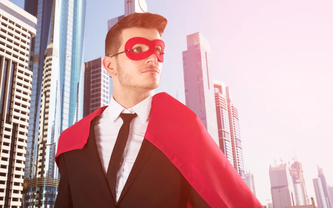 Superhero Businessman With Buildings In Background